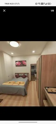 a bedroom with a bed in a room at BaanNiraบ้านนิรา in Ban Sam Kong