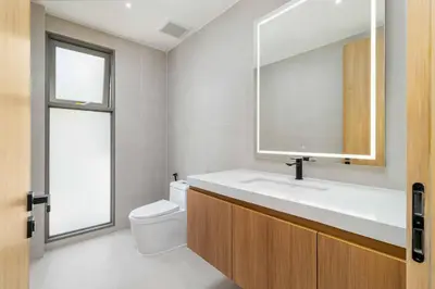 a bathroom with a sink and a toilet and a mirror at V293 Be the First! Brand New Elite Pool Villa in Ban Thalat Choeng Thale