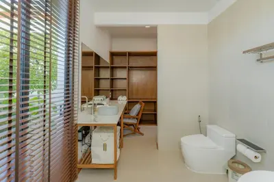 a bathroom with a toilet and a sink and a toilet istg at Taraburi 6BR Pool Villa Phuket VVPHU91 in Thalang