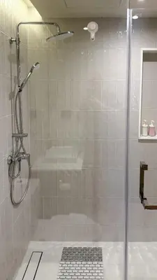 a shower with a glass door in a bathroom at Chardonnay Naiharn 1BR spacious apart BRAND new in Rawai Beach
