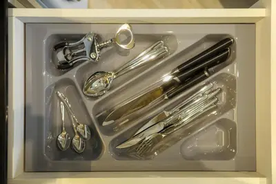 a drawer filled with silver utensils in a box at High-end 1BR at Title Bangtao by Sabay Rent E704 in Bang Tao Beach