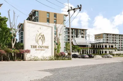 a large sign in front of a building at 1BR Ozon BangTao apartment in Laguna Phuket