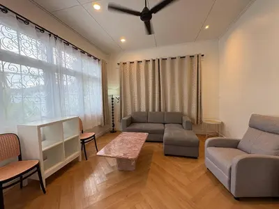 a living room with a couch and chairs and a table at 3BR Family Villa - 1 km to Chalong Pier with WiFi in Chalong