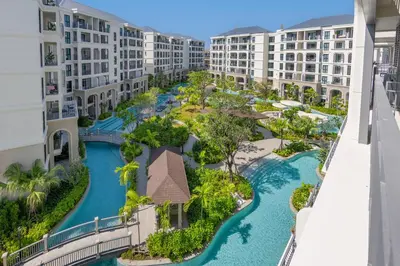 an aerial view of a resort with a pool at Safi 1BR Suite — The Title Legendary BangTao in Bang Tao Beach