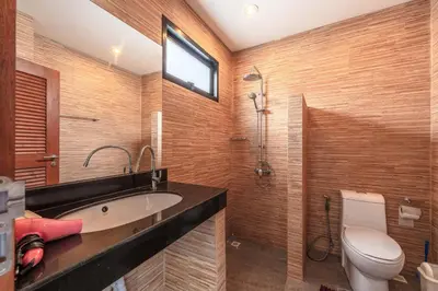 a bathroom with a sink and a toilet at 3 BR Pool Villa Salika near Rawai Beach in Ban Saiyuan (1)