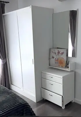 a bedroom with white cabinets and a bed at D Condo Mine Kathu Smart Monthly Living 30-Day Stay in Kathu