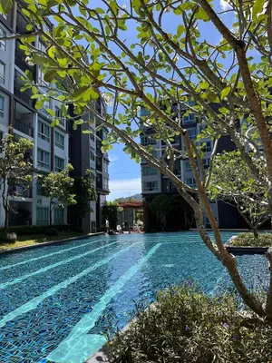 an empty swimming pool in the middle of a building at D Condo Mine Kathu Smart Monthly Living 30-Day Stay in Kathu