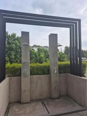 an open window with a view of trees at The Ark Condomisunset in Ban Karon