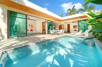 a swimming pool in a villa with a house at 2BR Pool Villa Kate - KA Villas near Rawai Beach in Rawai Beach