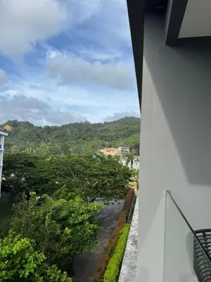 a view of a river from a balcony at Wyndham apartment Naithon in Nai Thon Beach