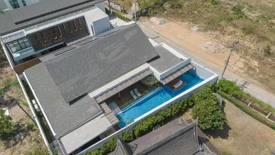 an overhead view of a house with a swimming pool at PRAIA Residence 5BR - Bangtao in Ban Pak Lak