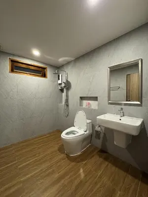 a bathroom with a toilet and a sink at KONE- 3BR Private Pool Villa Kathu near Patong in Ban Kathu