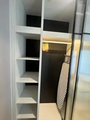 a walk in closet with a mirror in it at Квартира в Legendary Bang Tao in Bang Tao Beach