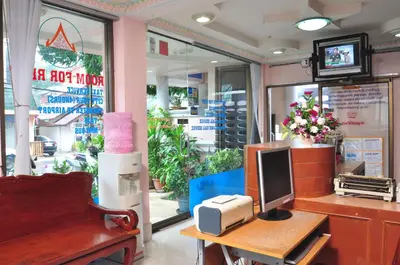 a store with a desk with a computer on it at Baan Boa Guest House in Patong Beach