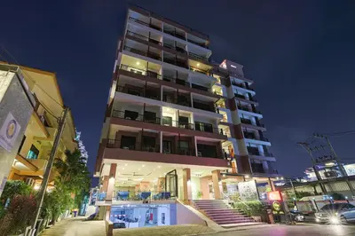 a tall building with stairs in front of it at The Gig Hotel in Patong Beach