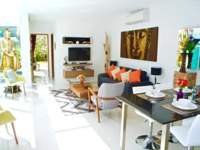 a living room with a couch and a table at Skylight 2 bedrooms Villa in Kamala in Kamala Beach