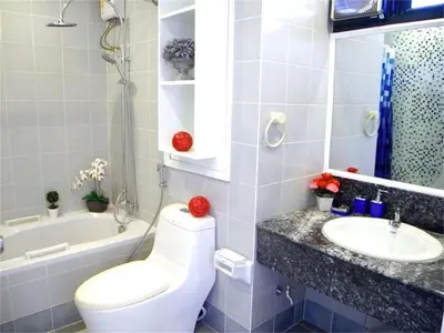 a bathroom with a toilet and a sink at Patong Tower 1-Bedroom Apartment Full Sea View in Patong Beach