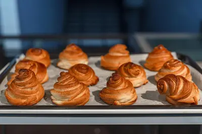 a tray of pastries on a baking sheet at Phuvaree Resort in Patong Beach