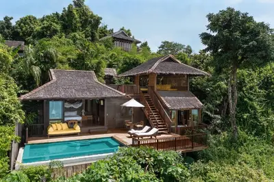 a villa with a pool and a resort at Six Senses Yao Noi in Ko Yao Noi