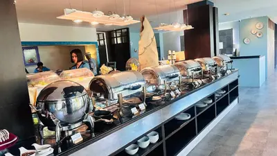 a buffet line with many pots and pans at Anyavee Tubkaek Beach Resort in Tab Kaek Beach