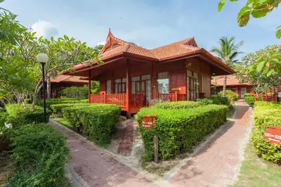 a house with a pathway leading to it at PP Erawan Palms Resort in Phi Phi Don