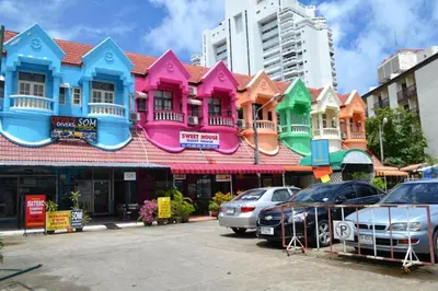 a row of houses on top of a building at Sweet Home Patong in Patong Beach