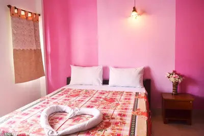 a bedroom with a bed with two hearts on it at Sweet Home Patong in Patong Beach