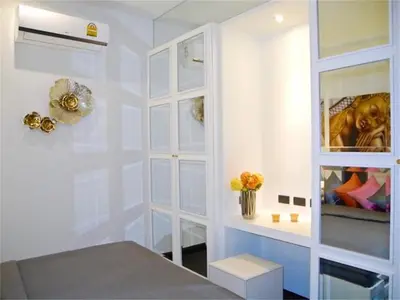a white room with a table and a window at COCO Chalong 2 bedrooms New Villa in Chalong