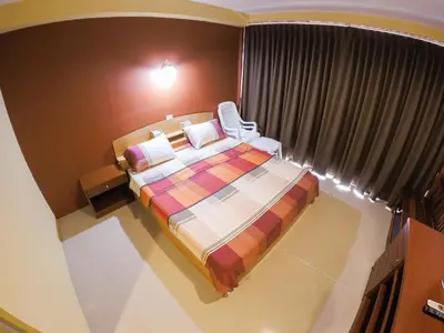 an overhead view of a bedroom with a bed at Madam House in Karon Beach