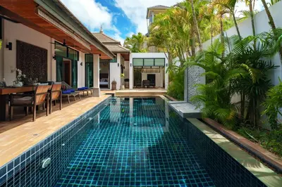 a swimming pool in a villa with a house at Emotion 1 Villa by G Estate in Rawai Beach