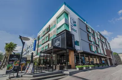 a building on the side of a street at The Bloc Hotel Phuket in Patong Beach