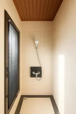 a shower in a bathroom with a window at VILLA PAGAI Pool Baan Bua Estate Naiharn in Rawai Beach