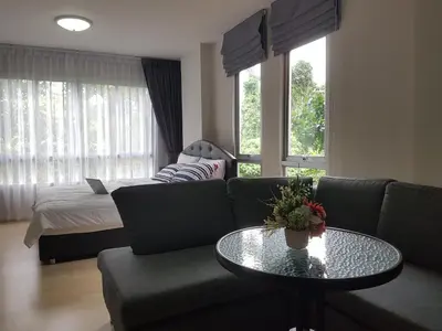a living room with a couch and a table and a bed at Dcondo Kathu Patong Phuket by Jack in Kathu