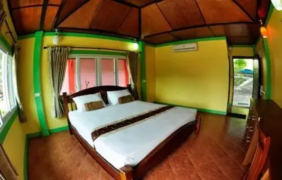 a bedroom with a large bed in a room at Phi Phi View Point Resort in Phi Phi Don