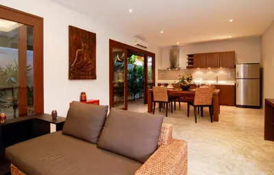 a living room with a couch and a dining room at Villa Susu by Holiplanet in Rawai Beach