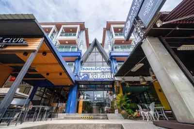 a group of shops in front of a building at Kokotel Krabi Ao Nang in Ao Nang Beach