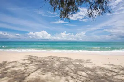 a view of a beach with the ocean at Luxury Oceanfront_pool access apartment in Mai Khao Beach