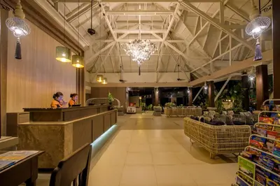 a restaurant with two people standing at a counter in a room at Krabi La Playa Resort in Ao Nang Beach