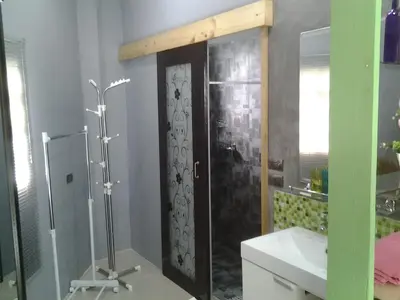 a bathroom with a shower and a sink at The Endless Bangtao Residence CAC 4 in Bang Tao Beach