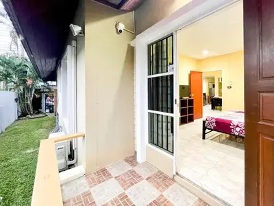 a door to a room with a view of a bedroom at The Endless Resident Private Pool Villa PSU in Bang Tao Beach