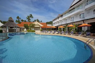 a large swimming pool in front of a hotel at Aonang Villa Resort l Lifestyle Beachfront Resort in Ao Nang Beach
