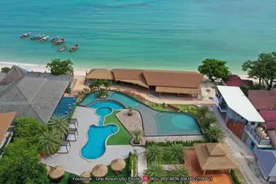 a rendering of a resort with a swimming pool and the ocean at U Rip Resort Phi Phi Hotel in Phi Phi Don
