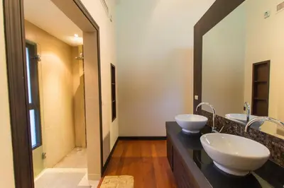 a bathroom with two sinks and a large mirror at Hidden Pool Villa A Hidden Haven Just For You in Rawai Beach