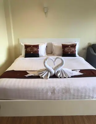 a large bed with a heart decoration on it at DB Residence in Patong Beach