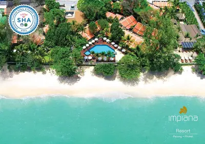 an aerial view of a resort on a beach at Impiana Beachfront Resort Patong, Phuket in Patong Beach