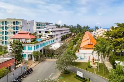 an aerial view of a city street with buildings at The Old Phuket - Karon Beach Resort in Karon Beach