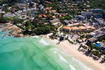 an aerial view of a beach and the ocean at Patong Paragon Resort & Spa SHA Extra Plus in Patong Beach