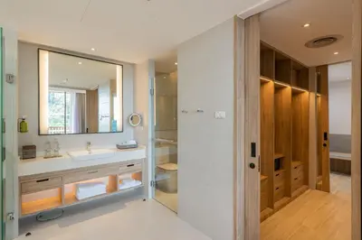 a bathroom with a sink and a mirror at Holiday Inn Resort Krabi Ao Nang Beach by IHG in Ao Nang Beach
