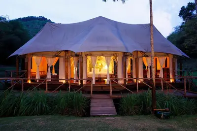 a large tent with a bed in it at Koyao Island Resort in Ko Yao Noi