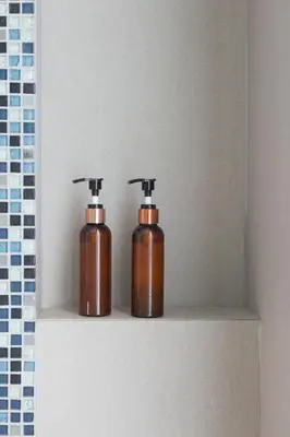 two fire hydrants sitting on a shelf in a bathroom at Oceanstone by Holy Cow, 2-BR, 90 m2, pool view in Bang Tao Beach